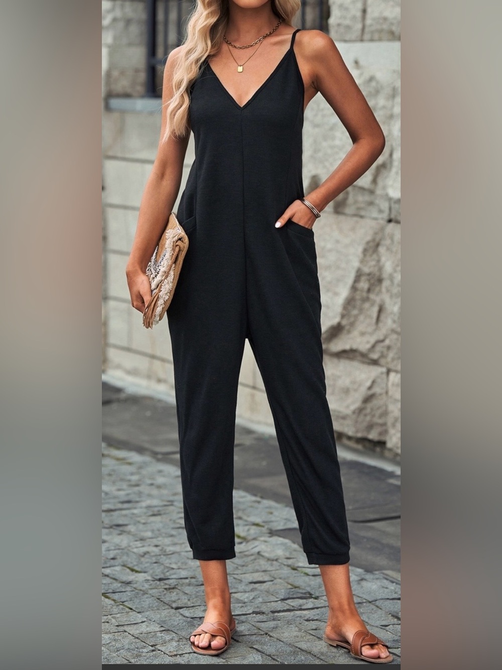 Black jumpsuit. Pockets. Boutique. Size large.